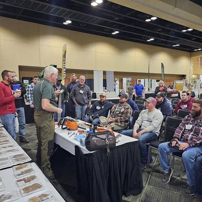 Group of men listening to presentation