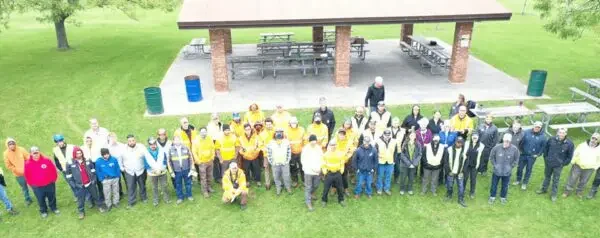 Aerial view of volunteers by picnic shelter